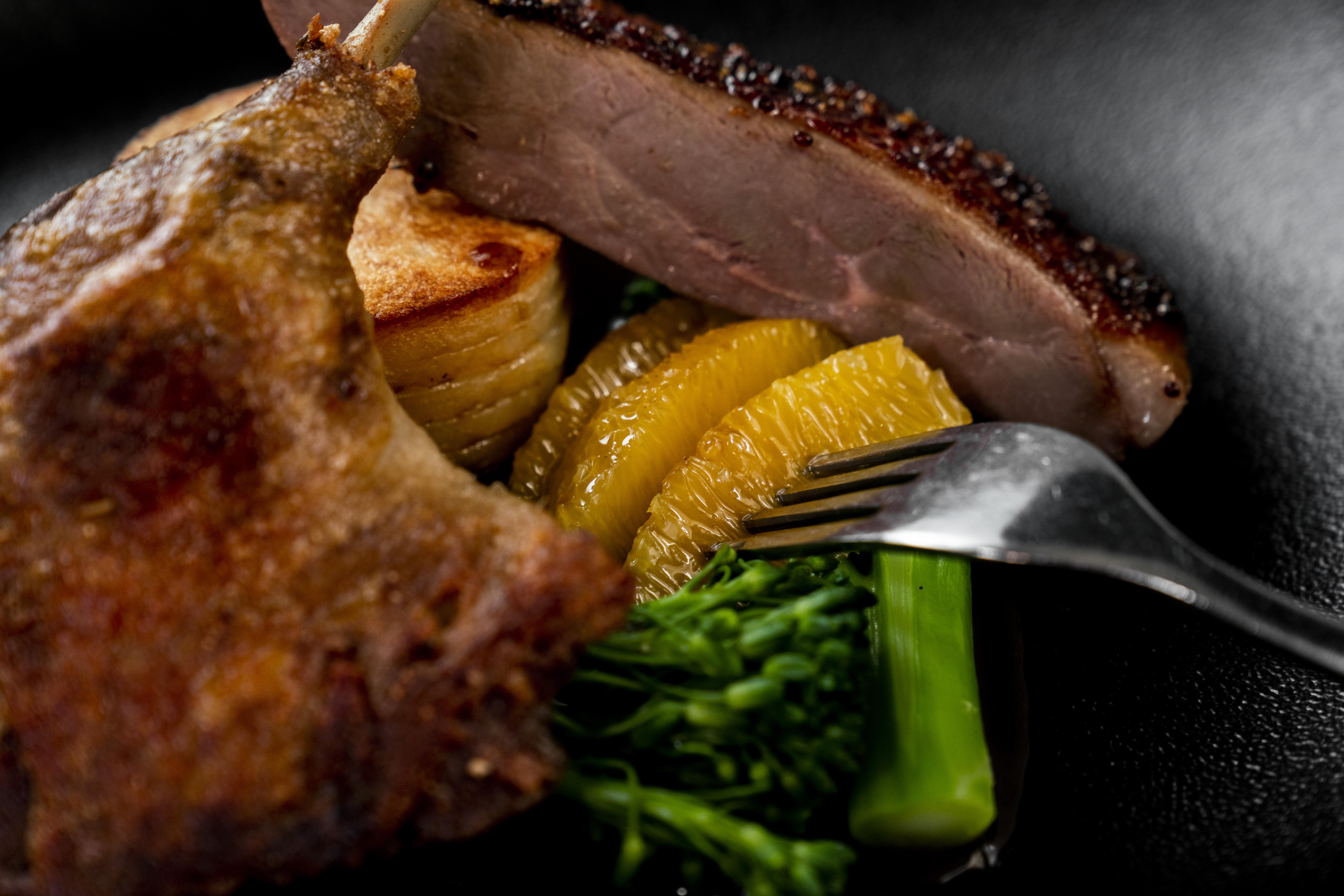 The Point Brisbane Hotel Zewnętrze zdjęcie A duck confit with orange and vegetables